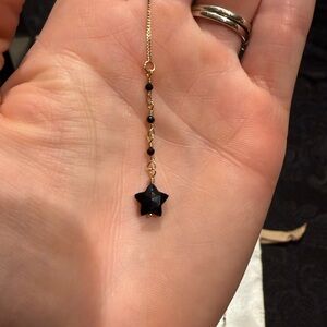 Gold and Black Star earrings